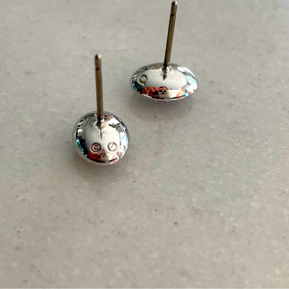 Genuine Swarovski Crystal silver rhodium plated earrings, with purple stone. - Picture 4 of 4